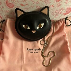 Kate Spade cross body Cat face bag . It  used a few times. With dust bag